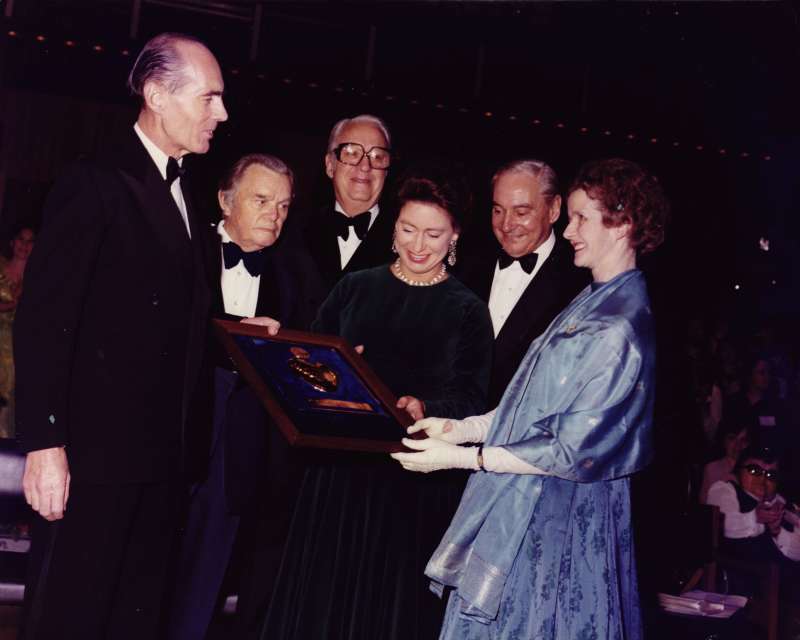 Princess Margaret presenting an award to a smiling Leonard Cheshire and Sue Ryder