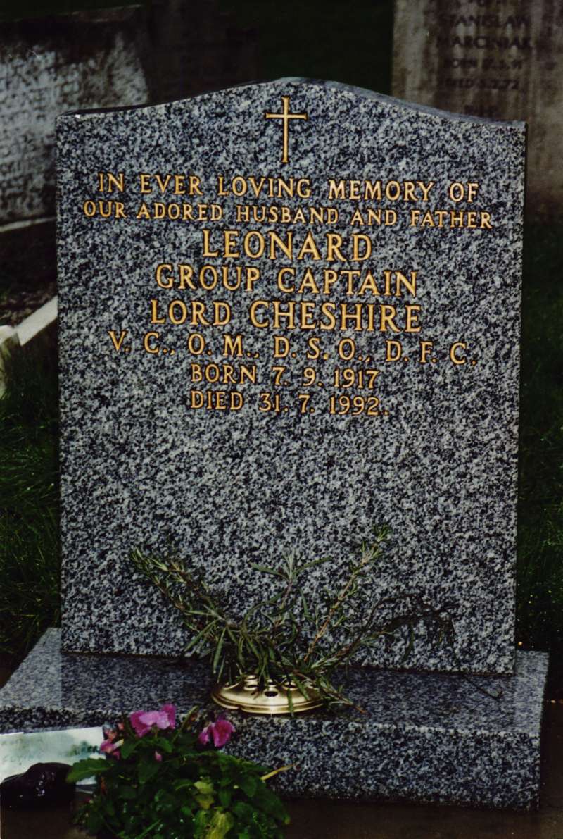 A close up of the burial headstone for Group Captain Leonard Cheshire