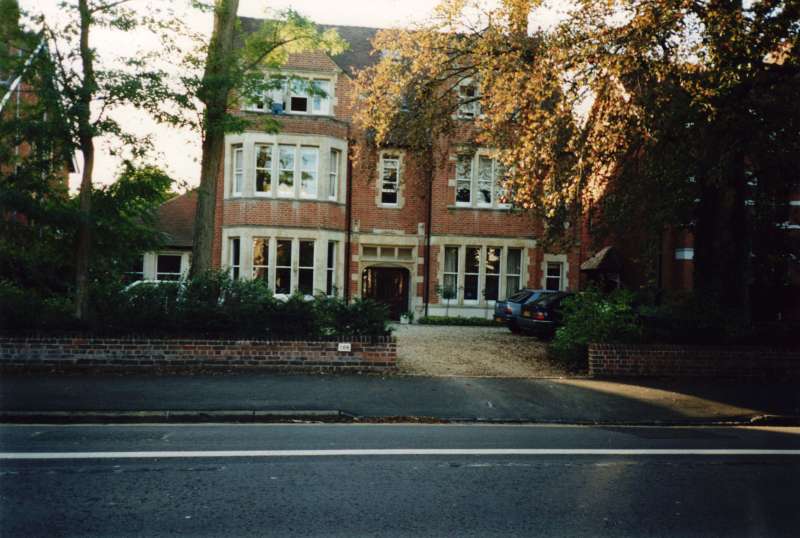 Colour photograph of a 3 storey detached house with bay windows