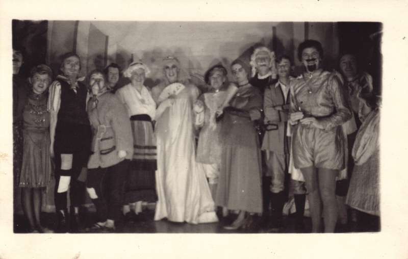 A group of people dressed in pantomime costumes